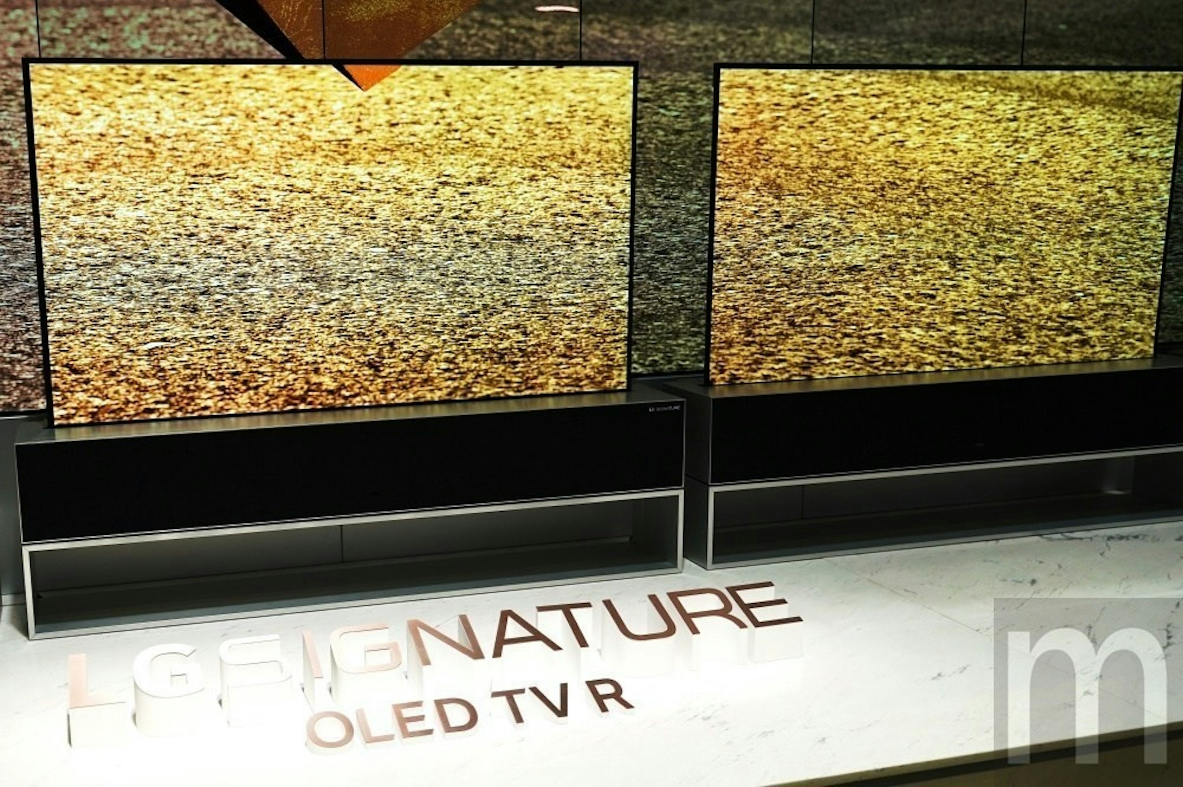 照片中提到了GEIGNATURE、m、OLED TV R，跟電影通行證有關，包含了壁、消費電子展、顯示裝置、有機發光二極管、OLED電視