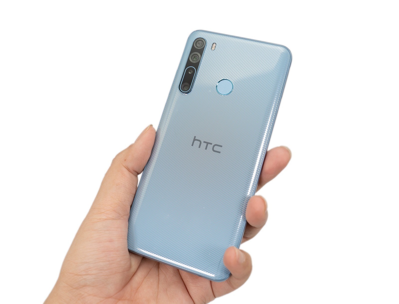 照片中提到了hTC,跟宏達電有關,包含了功能手機、功能手機、手機、產品設計、蜂窩網絡