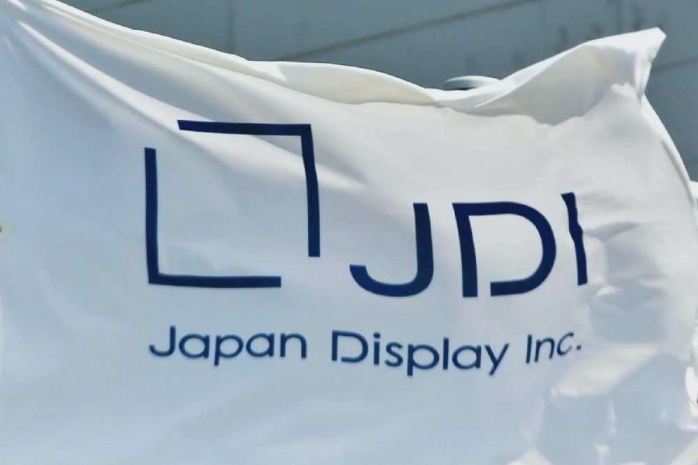 照片中提到了JDI、Japan Display Inc.，跟日本展示有關，包含了日本展示、牌、商標、旗幟、產品設計