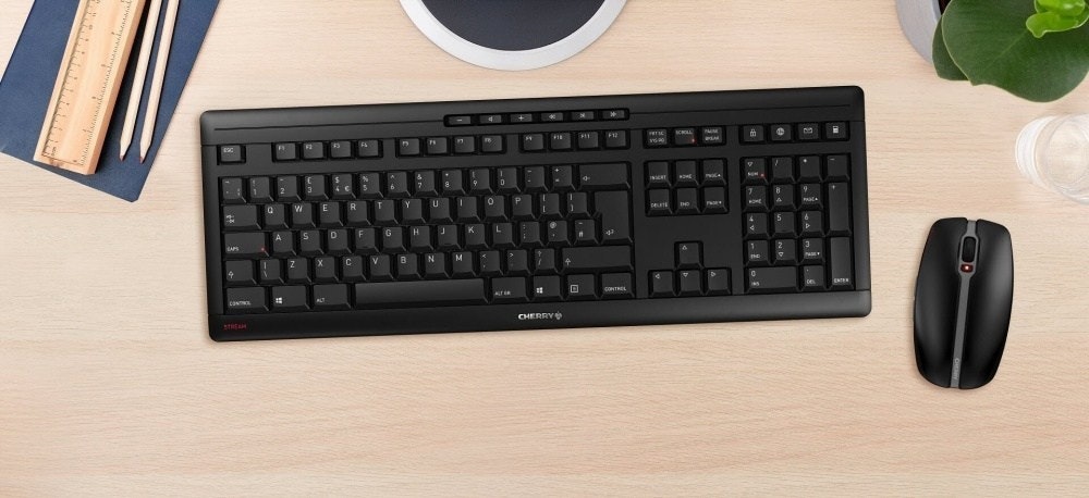 照片中提到了PAM、INSURT、R.，包含了櫻桃流鍵盤、計算機鍵盤、電腦鼠標、櫻桃STREAM鍵盤JK-8500DE-2、電腦