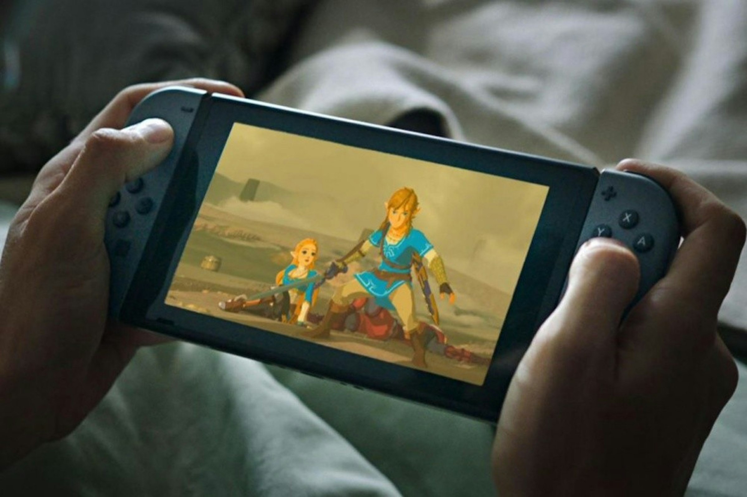 照片中包含了nintendio切換廣告、Wii U、塞爾達傳說：荒野之息、任天堂Switch、任天堂