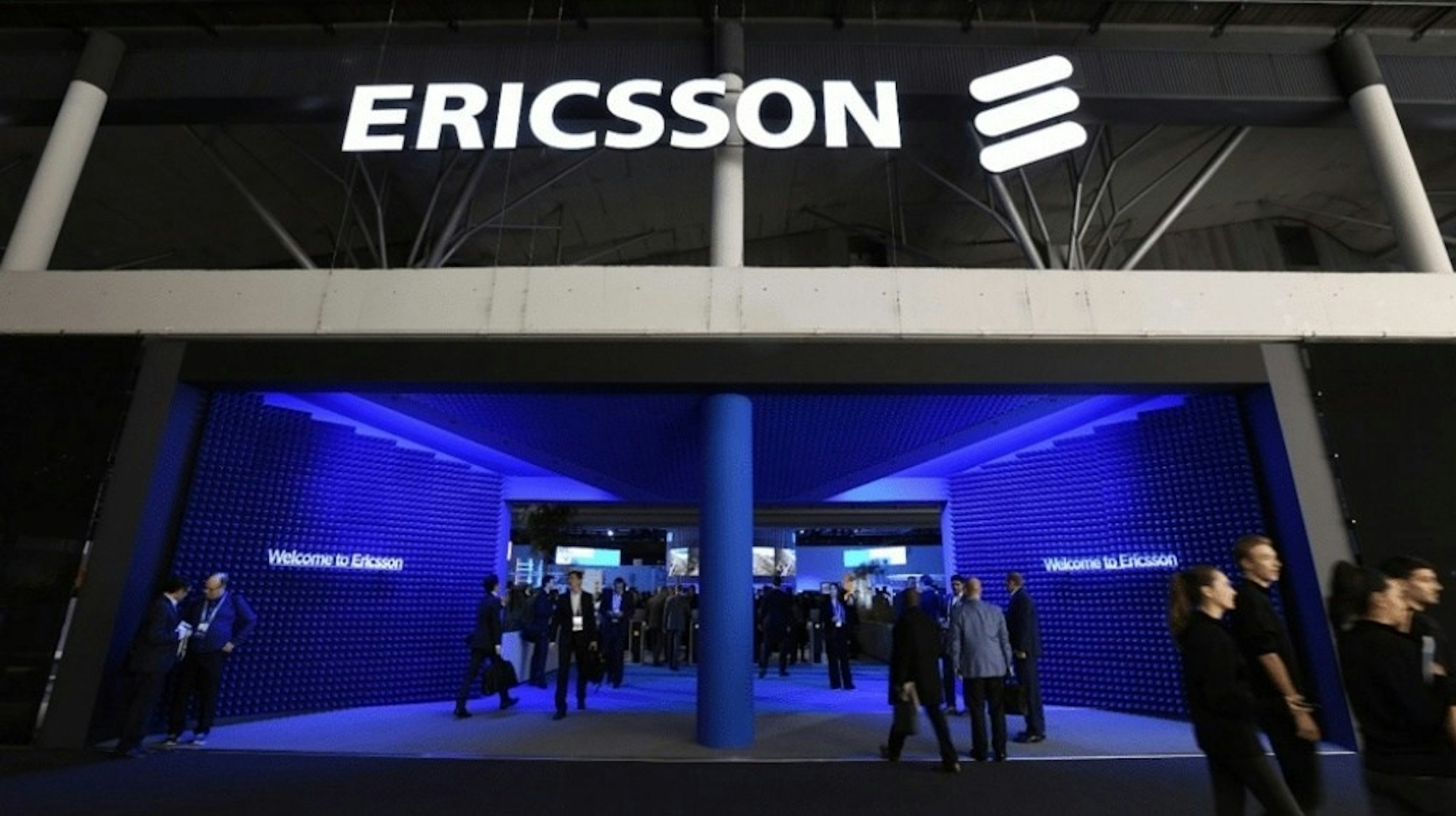 照片中提到了ERICSSON E、Welcome to Ericsson、Wilcome to Ericsson，跟愛立信有關，包含了愛立信移動世界大會、2019世界移動大會、MWC巴塞羅那2020、移動電話