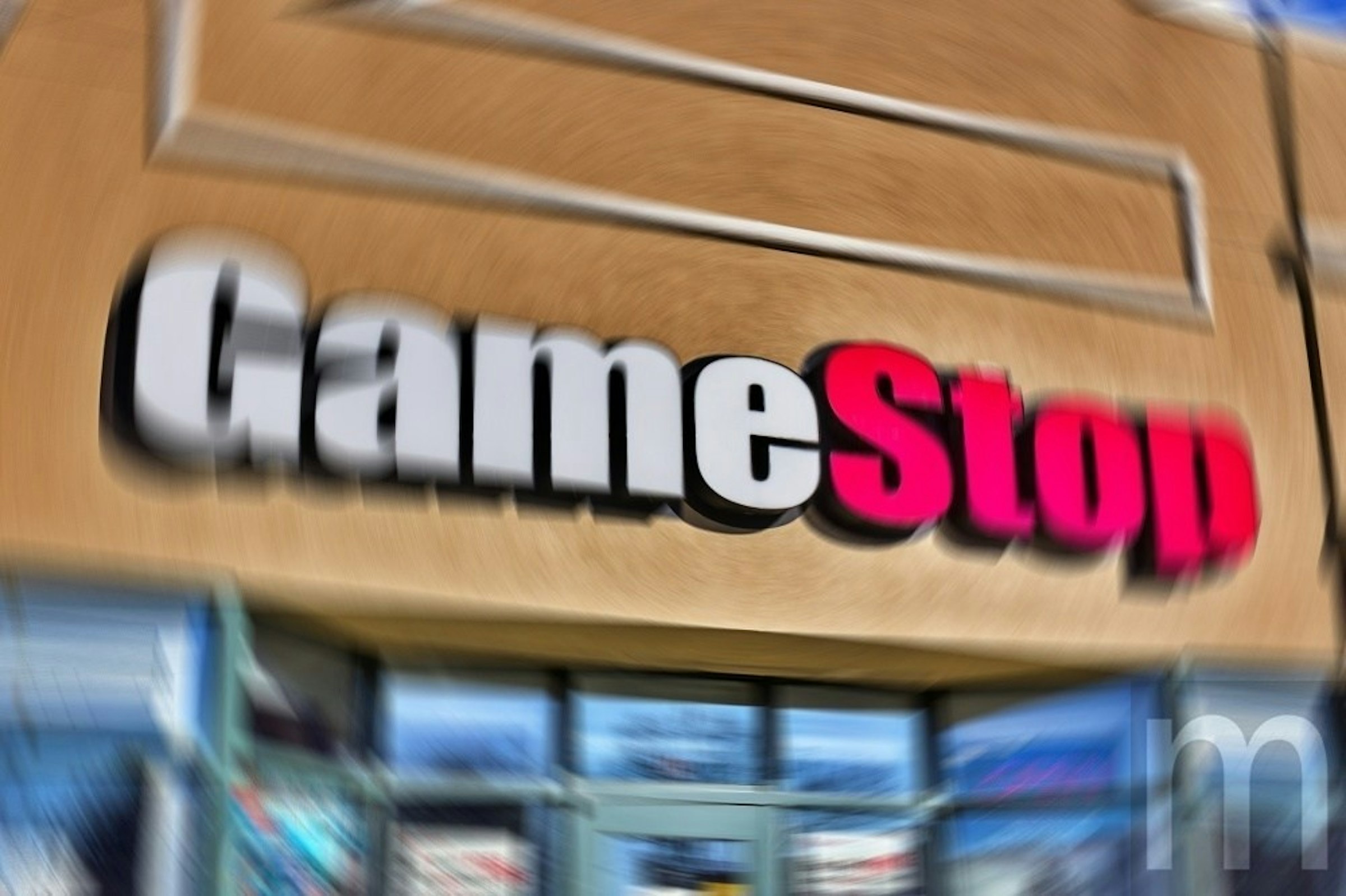 照片中提到了GameStop，跟遊戲停止有關，包含了標牌、牌、字形、工廠直銷店、儀表