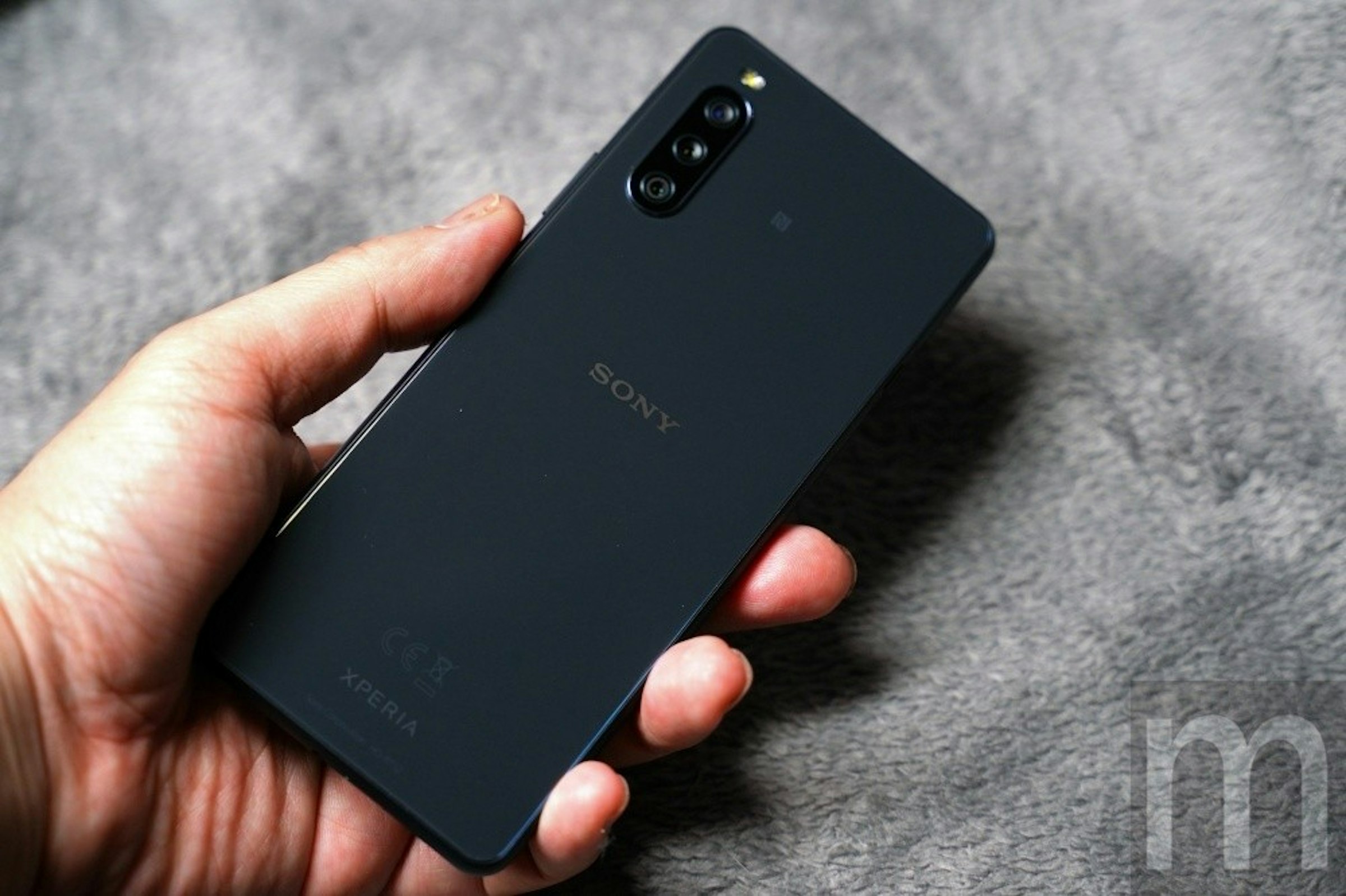 照片中提到了SONY、m、CEX，跟了索尼、電影通行證有關，包含了功能手機、功能手機、蜂窩網絡、移動電話、手機