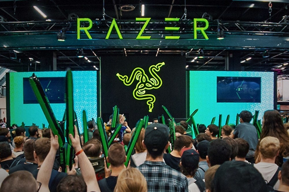 照片中提到了RAŻER，跟雷蛇公司有關，包含了亞洲遊戲展 2021、2022 年遊戲展、亞洲遊戲展、gamescom 2019、遊戲機
