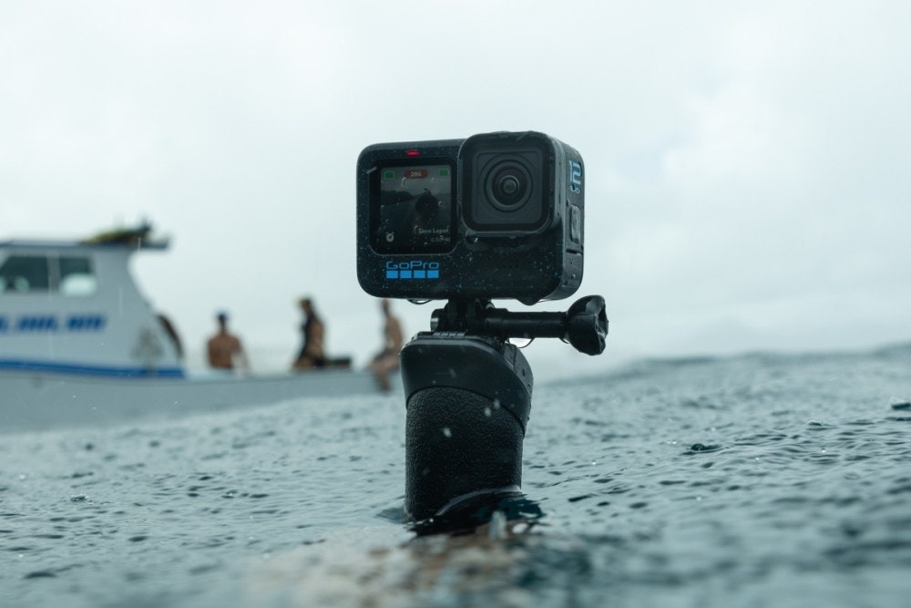 照片中提到了O、(Time Lapod、GoPro,包含了水、Q項目、AirPods Pro、蘋果、蘋果