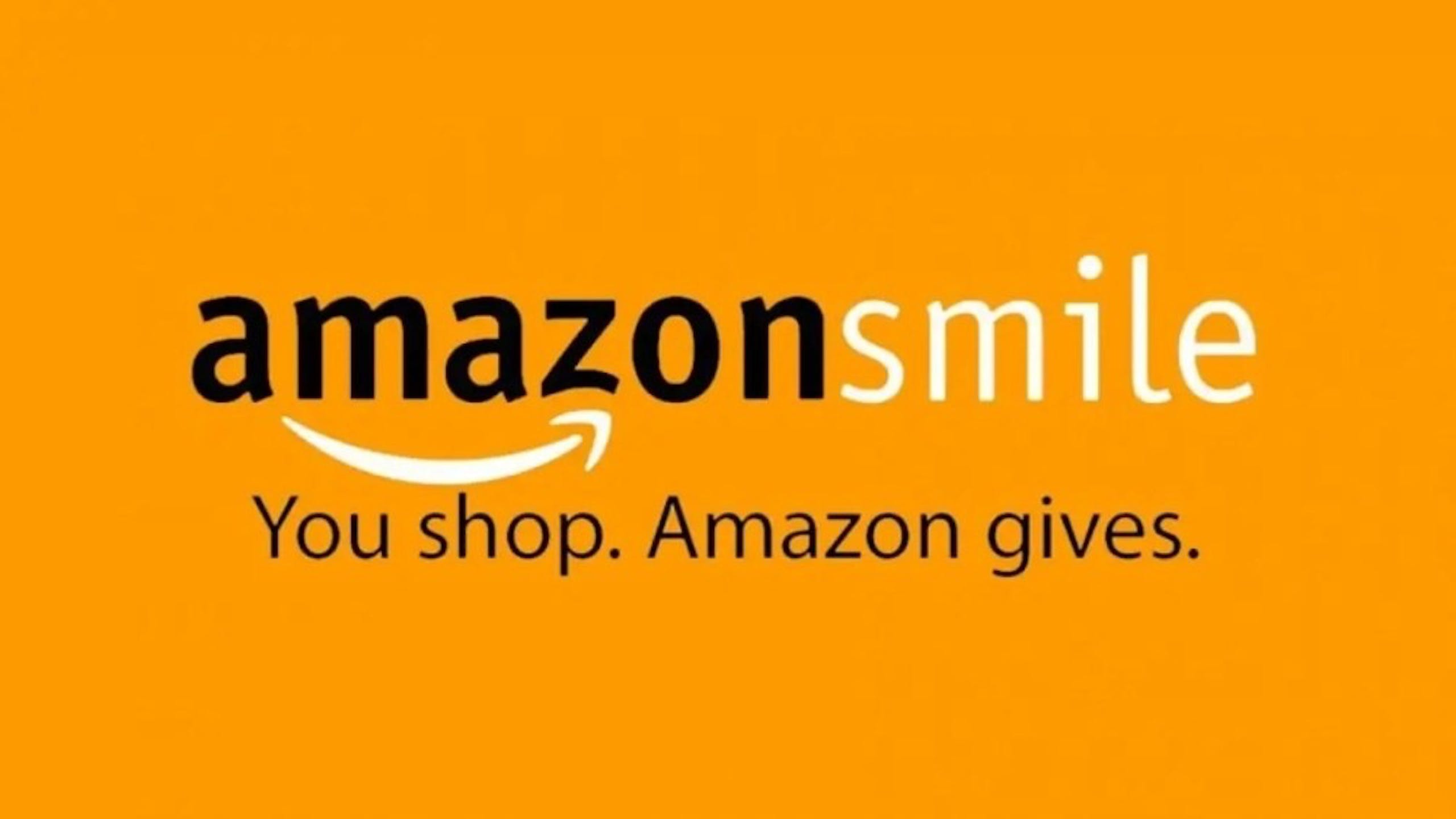 照片中提到了amazonsmile、You shop. Amazon gives.，跟亞馬孫有關，包含了亞馬遜微笑、亞馬遜網、慈善組織、亞馬遜中心櫃檯、購物