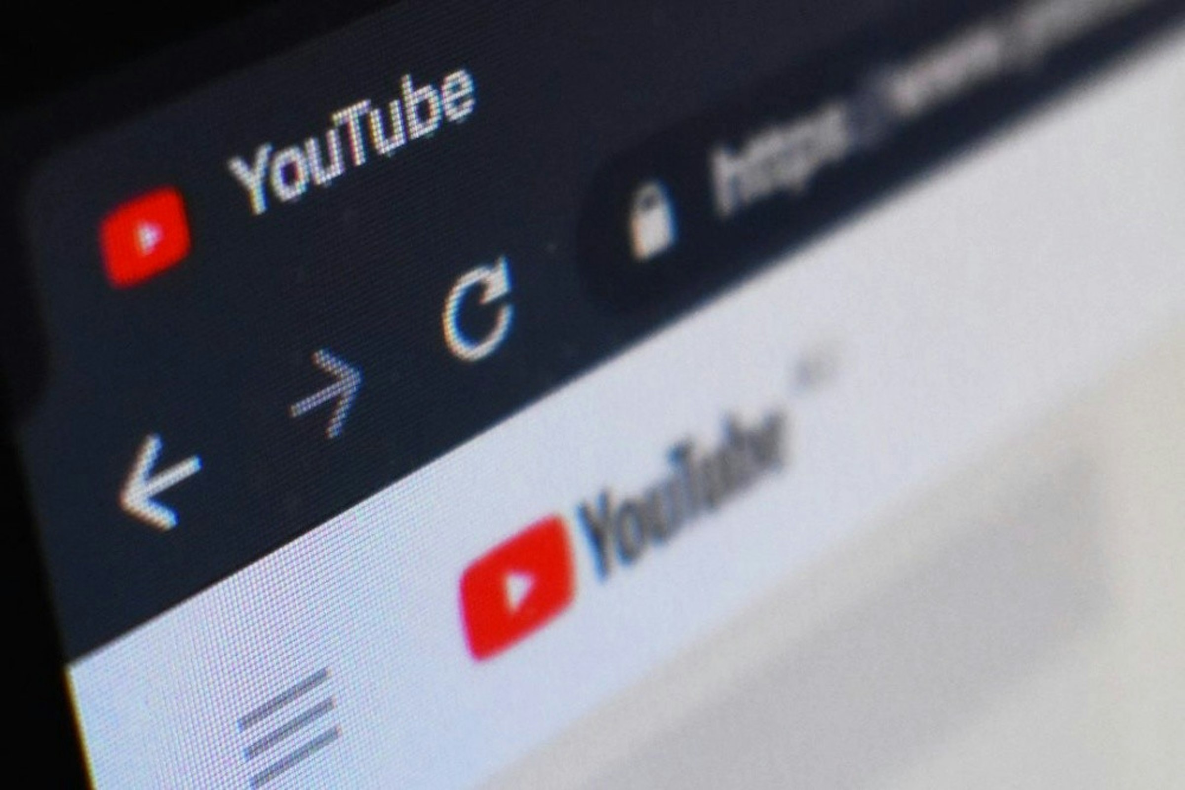 照片中提到了K、YouTube、← → C • http，包含了YouTube 短片、短、的YouTube、電視頻道、YouTube短褲