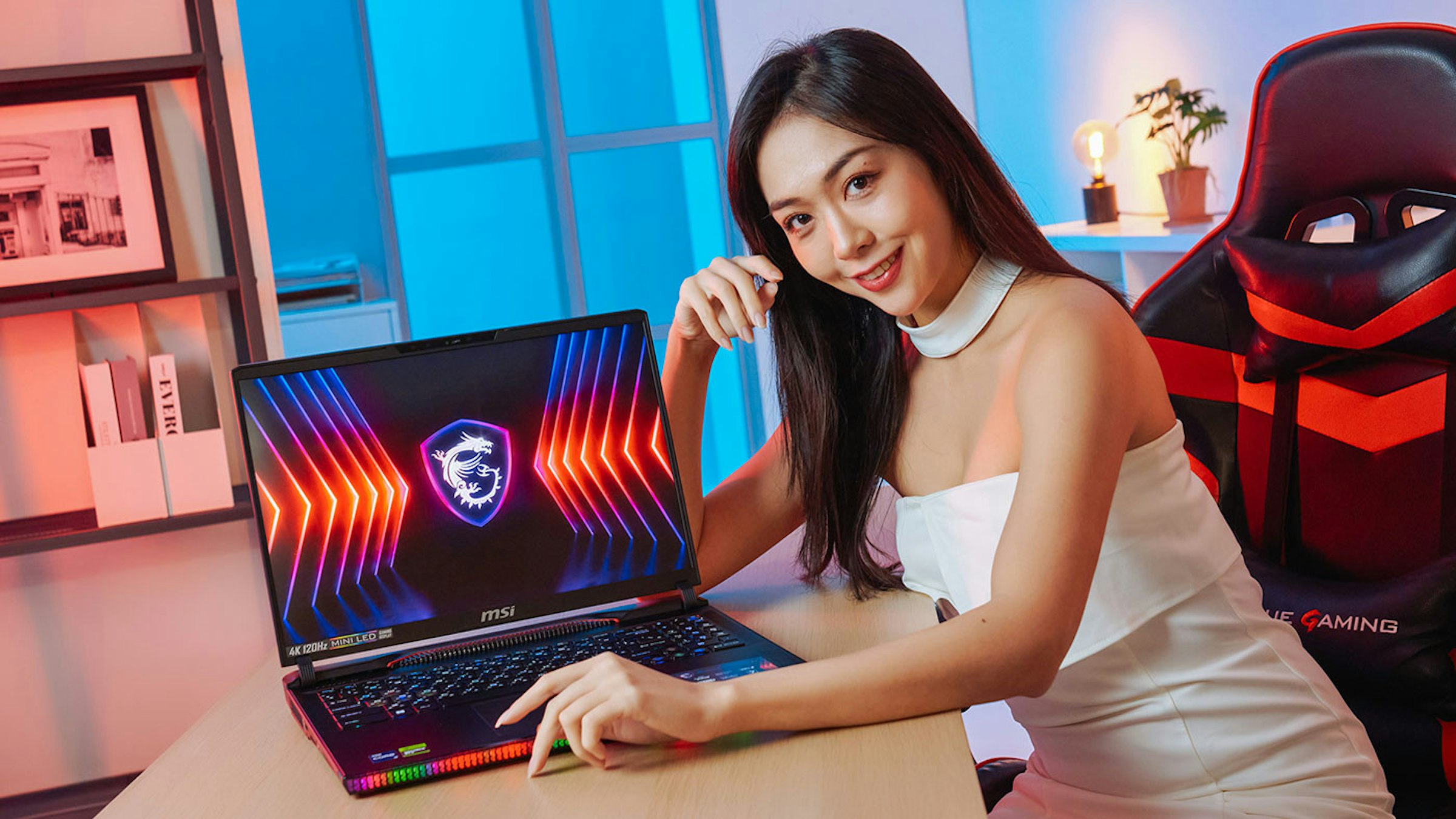照片中提到了-EVER、B、4K 120Hz MINI LED，跟微星國際有關，包含了女孩、攝影、電子產品、樂趣。、電子機器