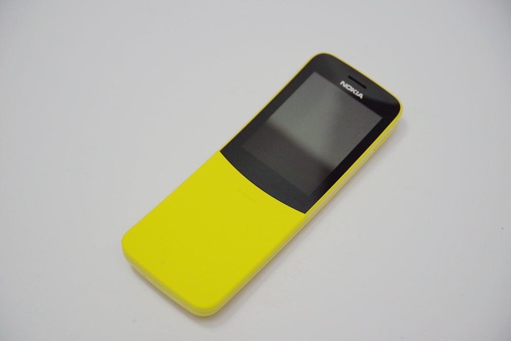 Feature phone, Smartphone, Product design, Product, Design, Mobile Phones, iPhone, feature phone, yellow, feature phone, mobile phone, electronic device, gadget, communication device, product, technology, portable communications device, product