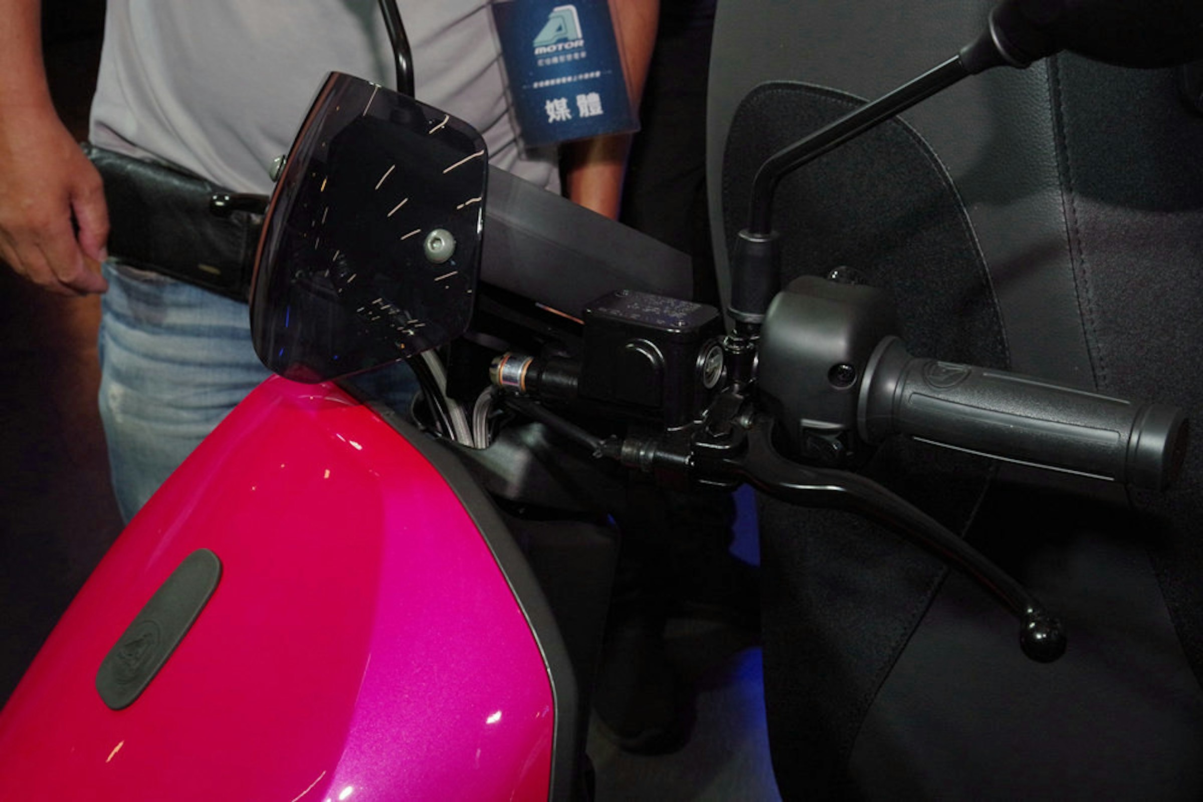 Car, Motorcycle accessories, Motorcycle, Motor vehicle, Automotive design, Vehicle, Technology, Design, Personal protective equipment, Electric motor, car, Automotive design, Material property, Technology, Vehicle, Windshield, Glass, Auto part, Gadget, Scooter, Window