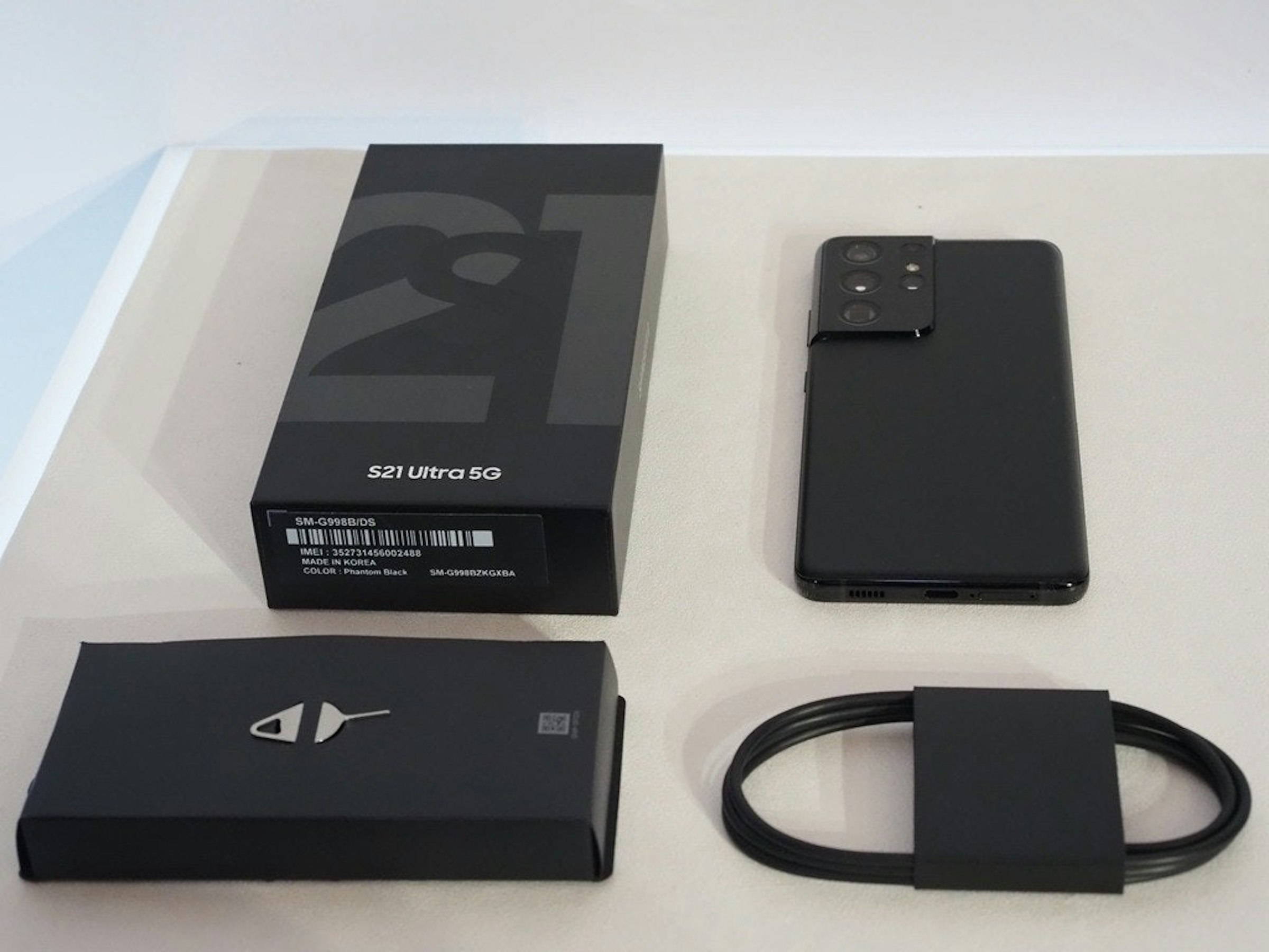 照片中提到了s21 Ultra 5G、SM-G998B/DS、IMEI: 352731456002488，跟百年靈SA有關，包含了電子配件、三星Galaxy S21 Ultra 5G、三星Galaxy S21 + 5G、三星Galaxy S21 5G、三星