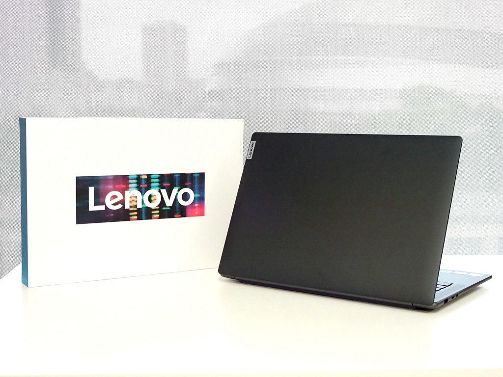 照片中提到了Lenovo，包含了筆記本電腦、產品設計、筆記本電腦、牌、設計