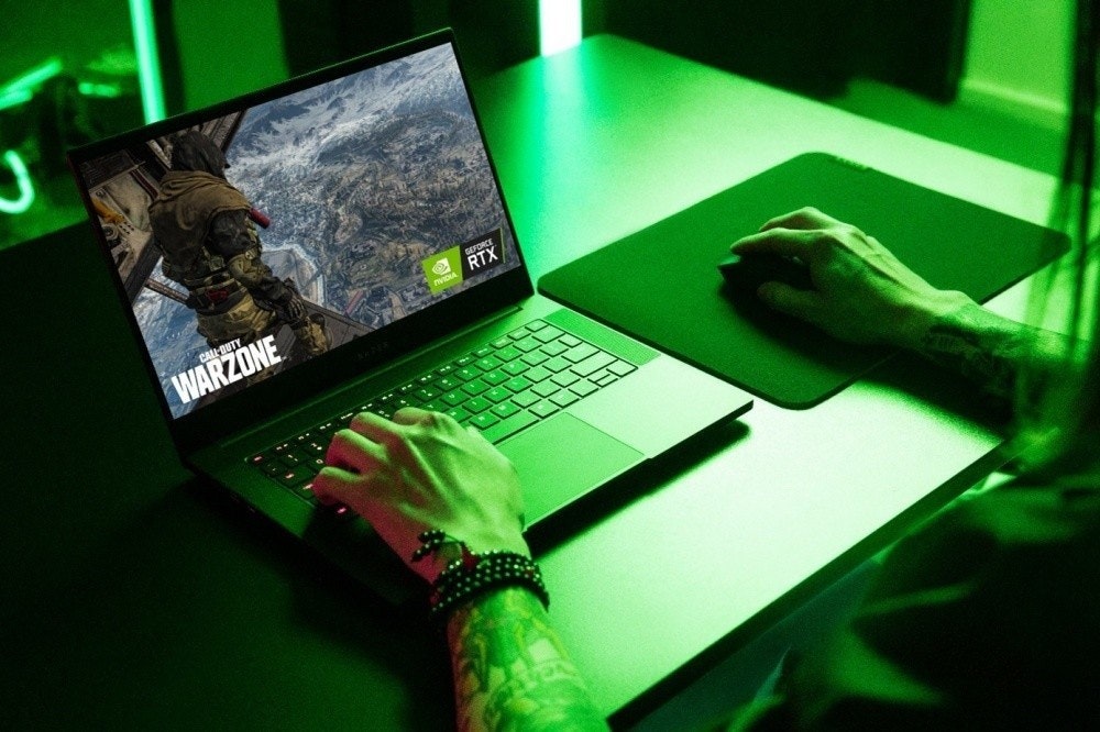 照片中提到了CALL-DUTY、WARZONE、GX,包含了雷蛇靈刃14 3070、Razer Blade(14 英寸,2021 年)、雷蛇靈刃 (14", 2022)、AMD公司、雷蛇