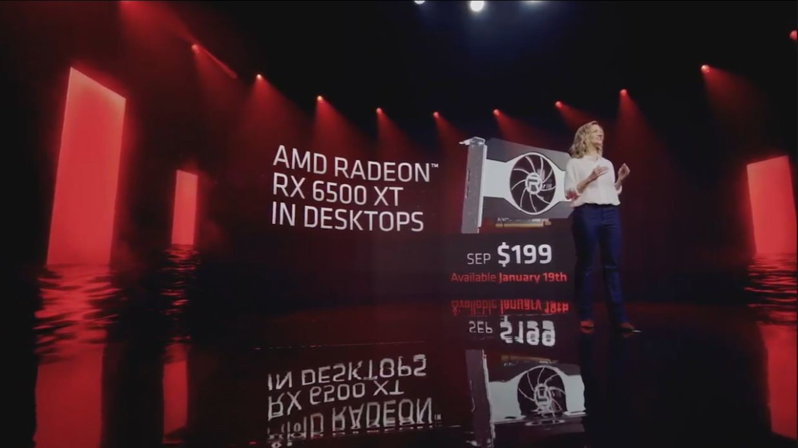 照片中提到了AMD RADEON"、RX 6500 XT、IN DESKTOPS，包含了階段、喜劇俱樂部、喜劇、牌、顯示裝置
