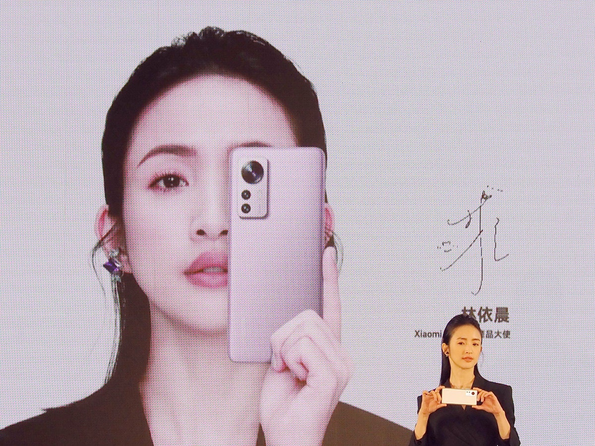 照片中提到了林依晨、Xiaomi、品大使，包含了頭、前額、面對、頭、藝術