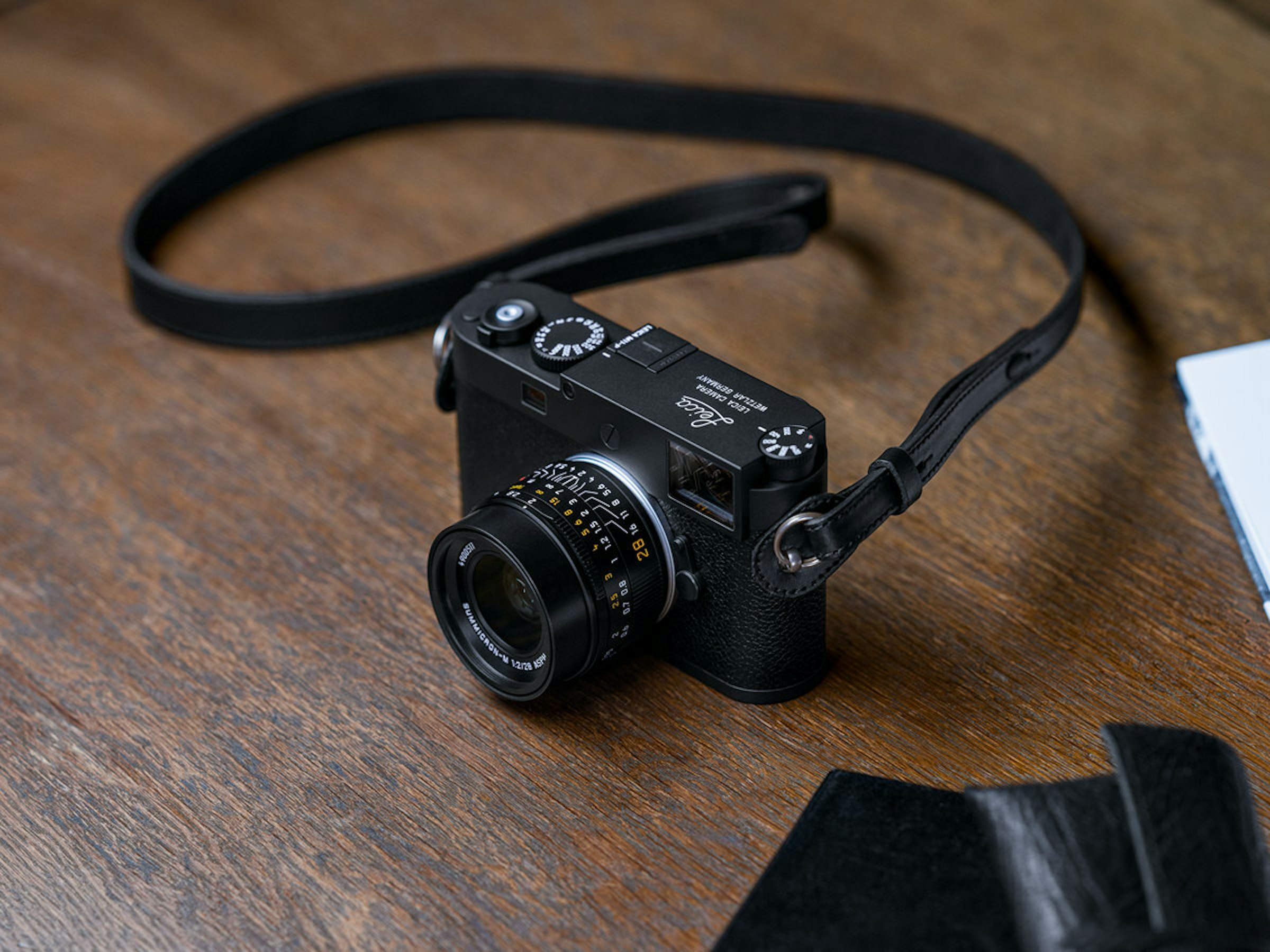 照片中提到了SUMMICRON、84、1 1.2 1.5，包含了鏡頭、單反相機、鏡頭、單反相機、相機