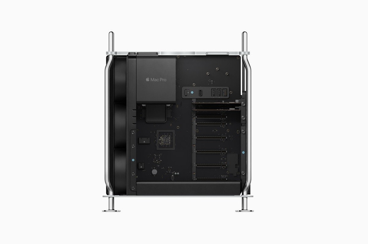 照片中提到了Mac Pro、DON,包含了電腦機箱、蘋果手機、電腦、印度、蘋果
