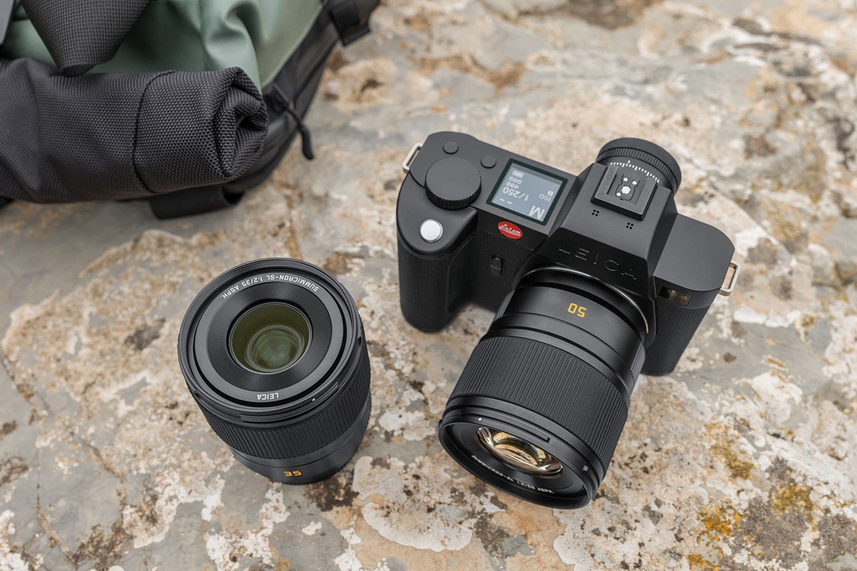 照片中提到了50、LEICA、⠀⠀,包含了數碼單反、單反相機、鏡頭、鏡片、攝影