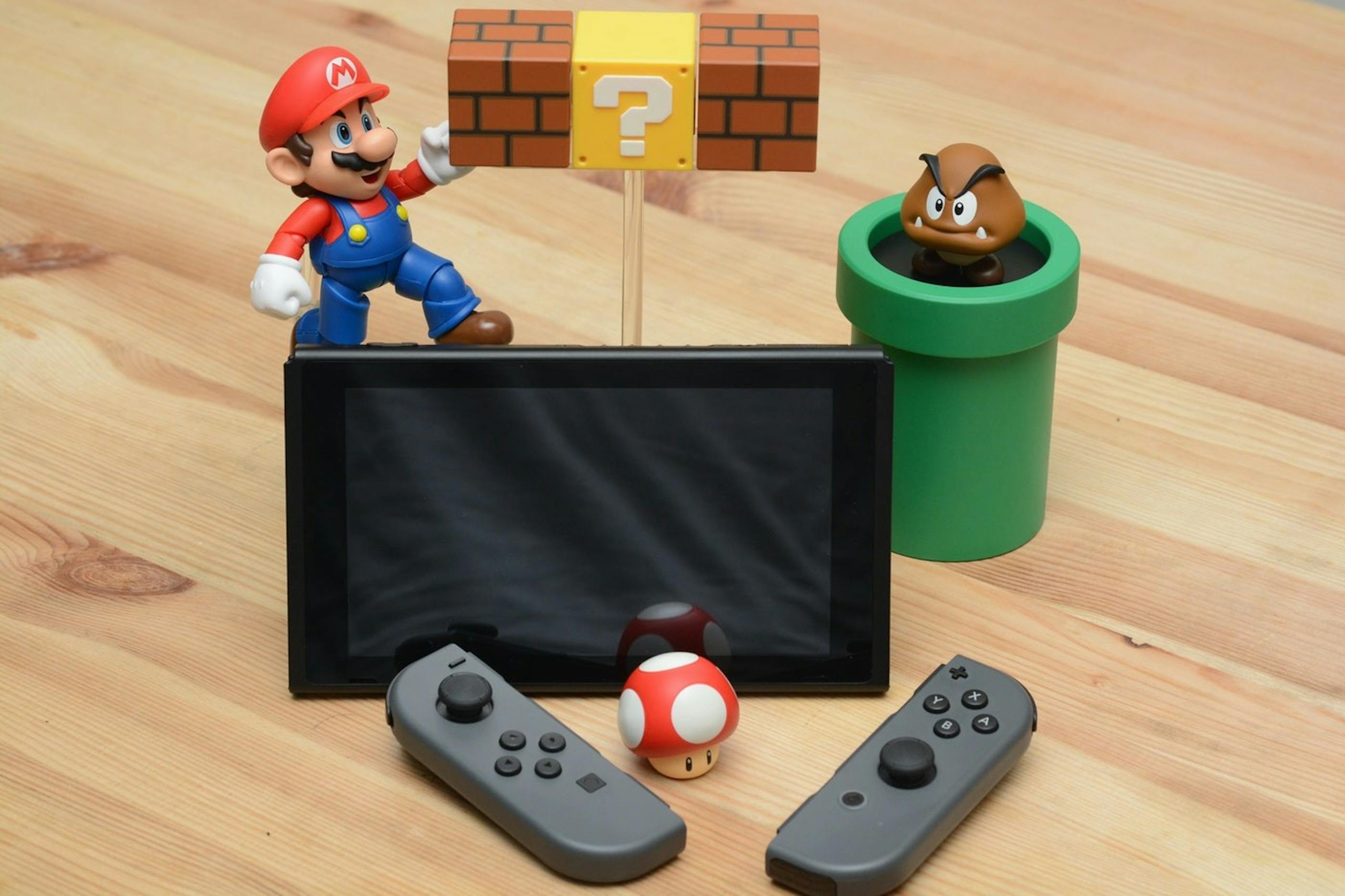 照片中提到了ງ，包含了任天堂Switch、岩田聰、任天堂開關精簡版、任天堂、喬伊·康