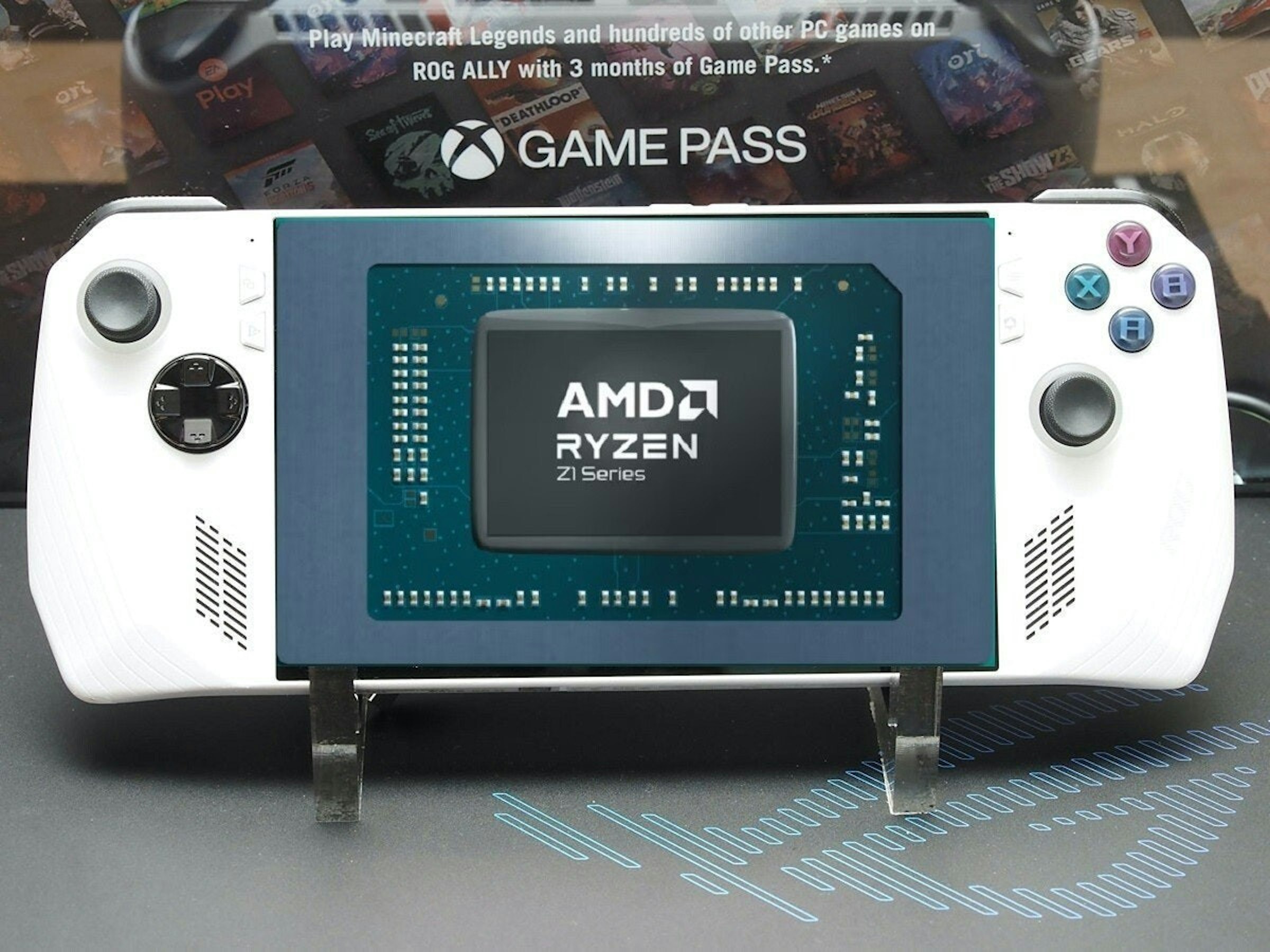 照片中提到了or、EN、Play，跟Xbox遊戲通行證、Advanced Micro Devices公司有關，包含了華碩 rog ally usb、顯示卡、掌上游戲機、ASUS ROG XG 行動 eGPU 擴充座 NVIDIA GeForce RTX 4090 筆記型電腦 GPU GC33Y-059、華碩rog盟友