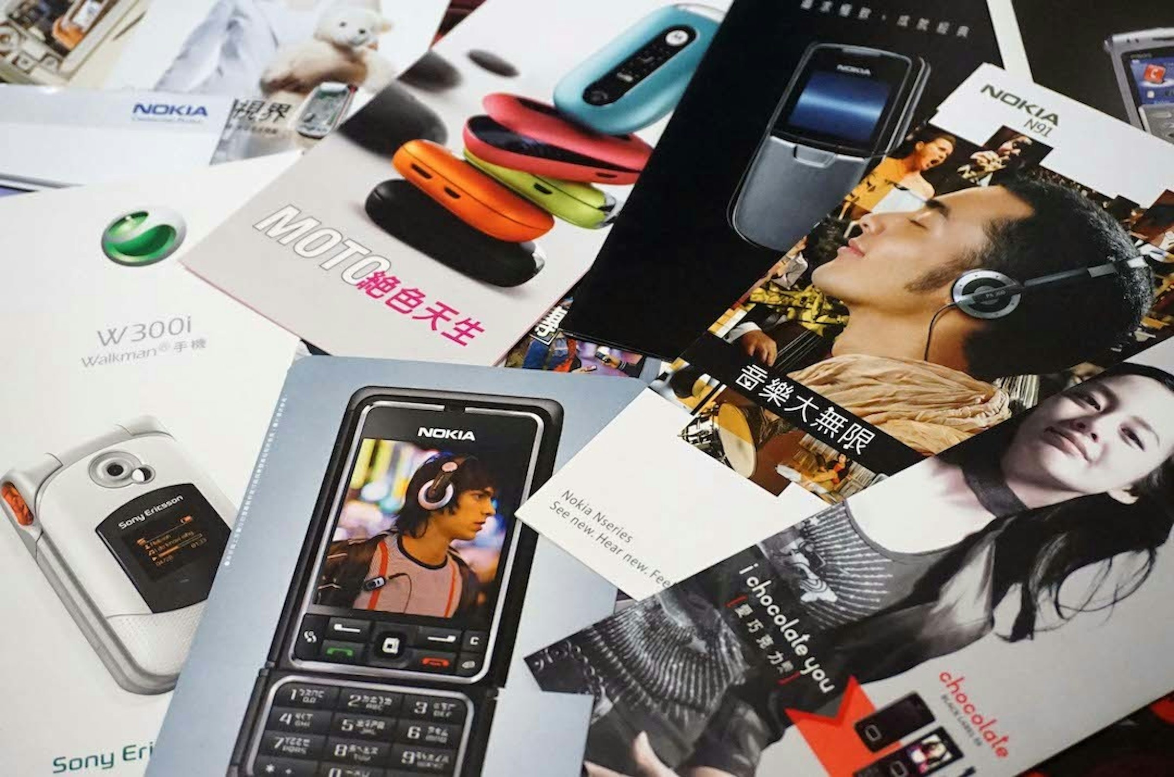 照片中提到了典、NOKIA、N91，跟諾基亞、強生有關，包含了電子產品、手機、便攜式通訊設備、產品設計、通訊