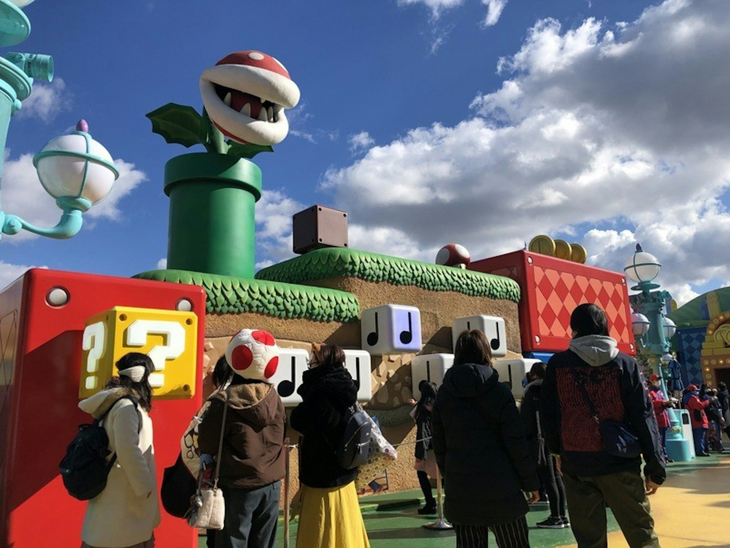 照片中包含了公平、2019–20年冠狀病毒大流行、中央流行病指揮中心、中央通訊社、日本環球影城