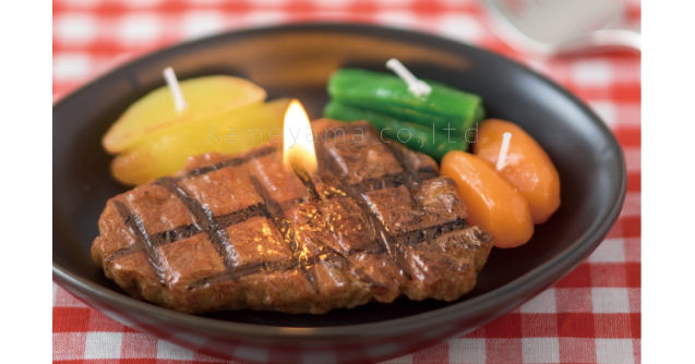 照片中提到了meyana，包含了ステーキ 故人の好物、牛扒、蠟燭、奶酪牛排、烤牛肉
