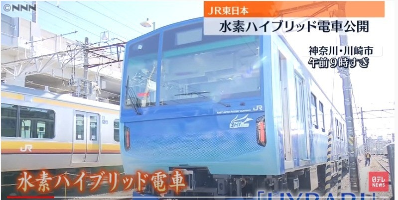 照片中提到了ONNN、JR東日本、水素ハイブリッド電車公開，跟泰博學院、全球新聞網有關，包含了有軌電車、培養、公共交通、鐵路交通、有軌電車