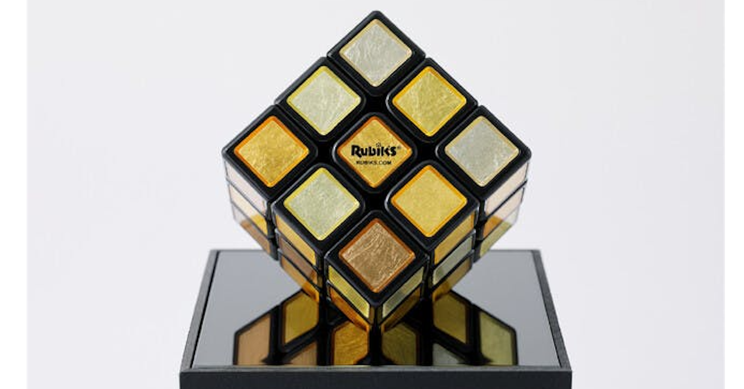 照片中提到了P、Rubiks、MOKS.COM，包含了玩具星球魔方魔方、魔方、魔方 - 3X3、難題、魔方