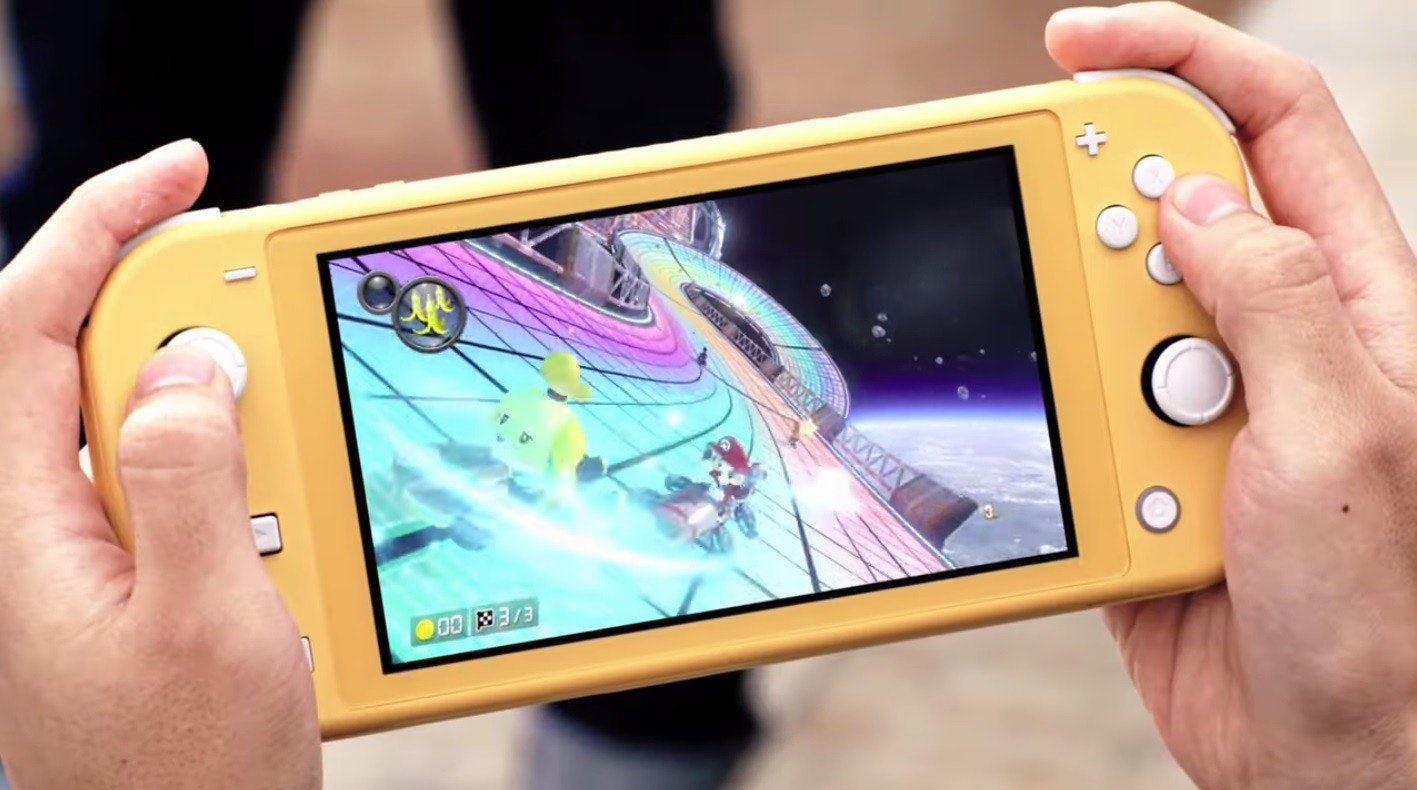 照片中提到了wwww、00 3/3,包含了任天堂Switch Lite評論、任天堂Switch、任天堂開關精簡版、任天堂、任天堂