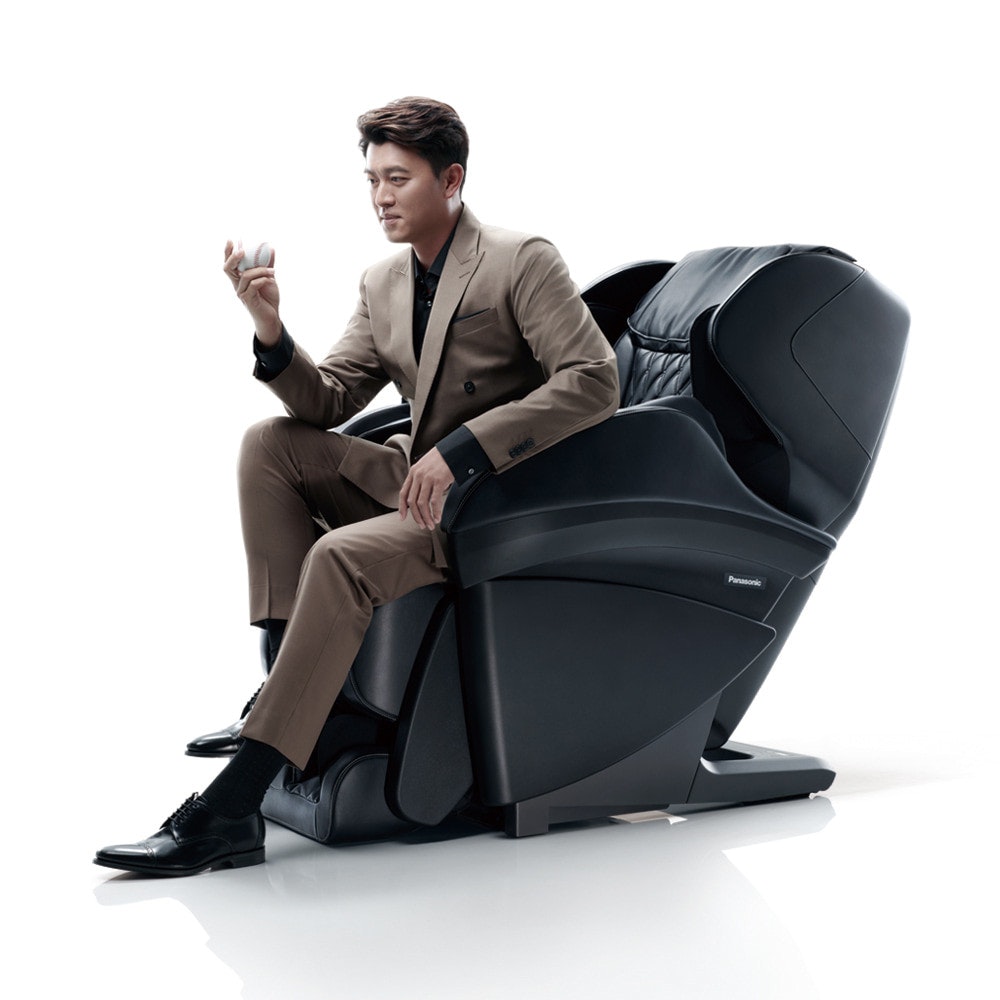 照片中提到了Panasonic，包含了坐著、按摩椅、躺椅、椅子、德代