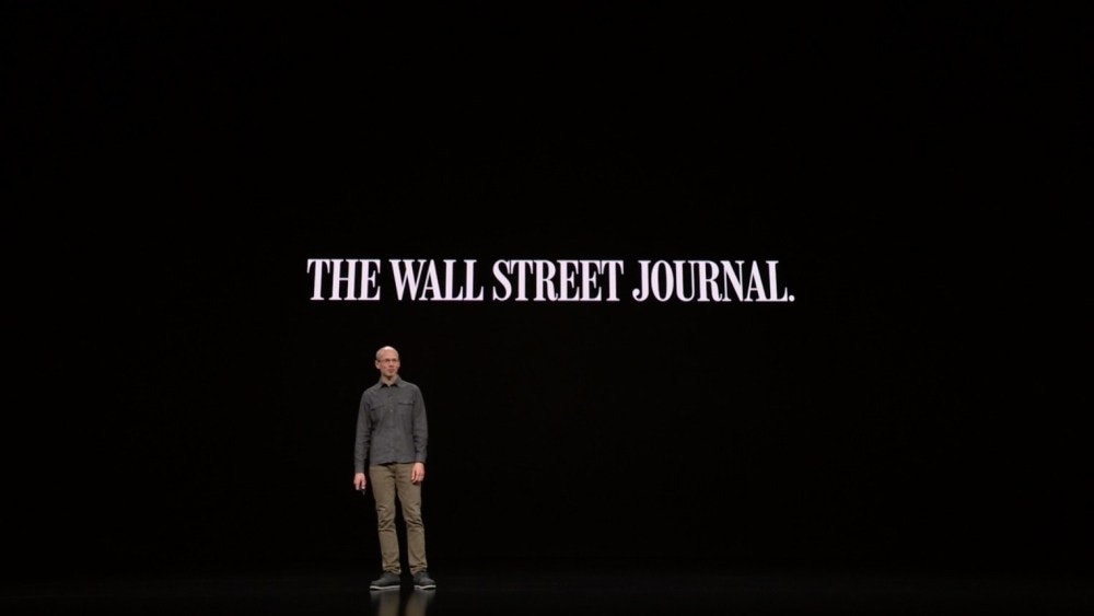 照片中提到了THE WALL STREET JOURNAL.，跟約翰斯頓和墨菲有關，包含了華爾街日報、iPhone 11專業版、蘋果新聞、蘋果、蘋果