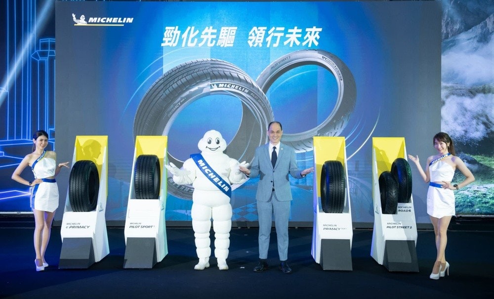 照片中提到了MICHELIN、動化先驅領行未來、LOT STREET,跟米其林、巨型自行車有關,包含了能源、累、米其林 Pilot Sport 5、米其林至上